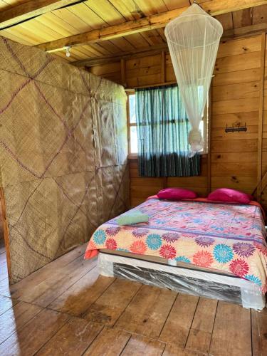 Katil atau katil-katil dalam bilik di Pachamaya River Hostel