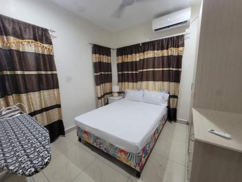 Llit o llits en una habitació de Alis786 Apartment