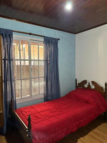 Postel nebo postele na pokoji v ubytování Casa con pileta y patio privado en Ibarlucea