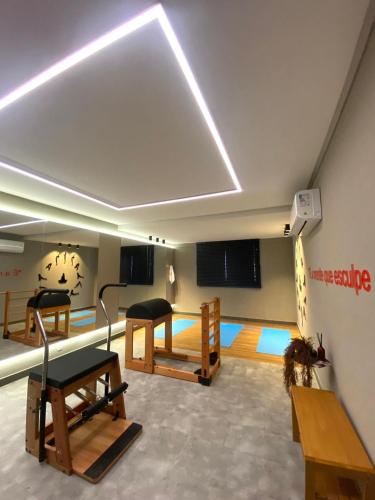 Studio Design 3 Apt 802 -Mandi Hospitalidadeにあるテレビまたはエンターテインメントセンター