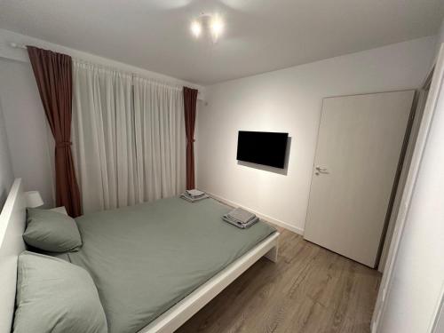 Postel nebo postele na pokoji v ubytování Myhouse 1