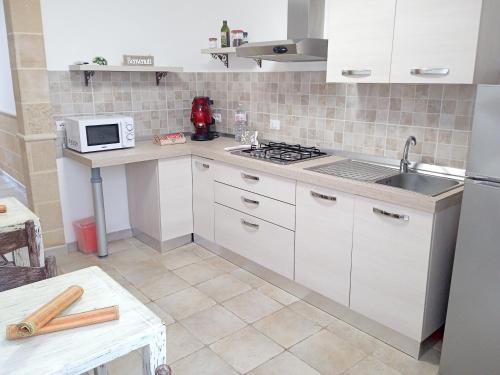 Kuchyň nebo kuchyňský kout v ubytování Casina Sofia