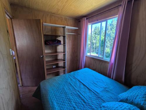 Postel nebo postele na pokoji v ubytování Cabaña Ola Azul