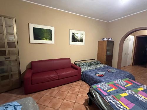 Un pat sau paturi într-o cameră la Antonio's villa al mare con vista sull'Etna Vaccarizzo Catania