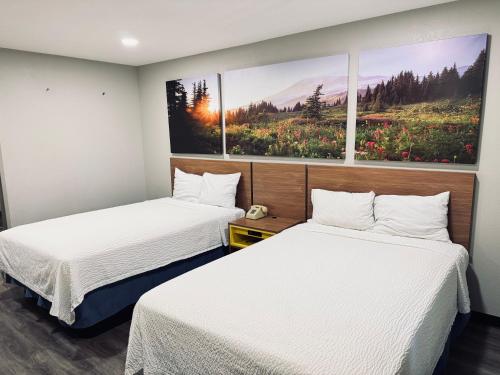 Ένα ή περισσότερα κρεβάτια σε δωμάτιο στο Days Inn by Wyndham Barstow