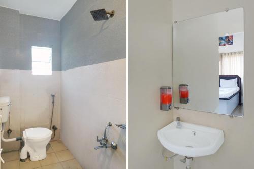 Ένα μπάνιο στο Hotel O Happy Homely Stay