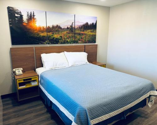 Ένα ή περισσότερα κρεβάτια σε δωμάτιο στο Days Inn by Wyndham Barstow