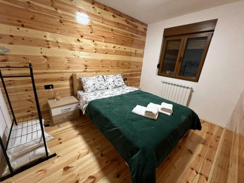Postel nebo postele na pokoji v ubytování Apartments S&S
