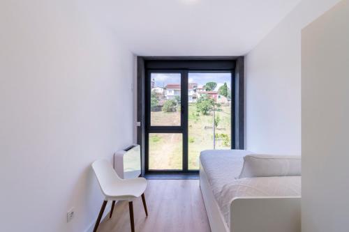 Χώρος καθιστικού στο Urbanfive apartamentos Ourense centro