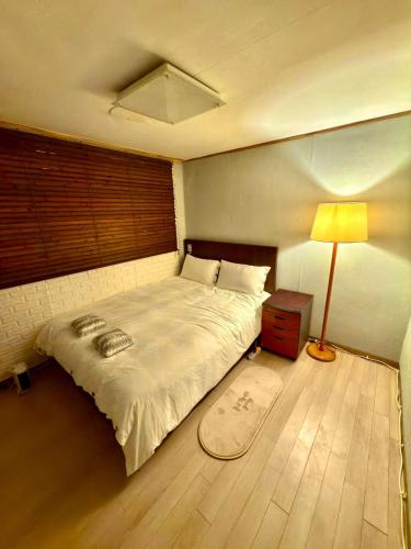 Postel nebo postele na pokoji v ubytování Private Family Home, 2-bedrooms