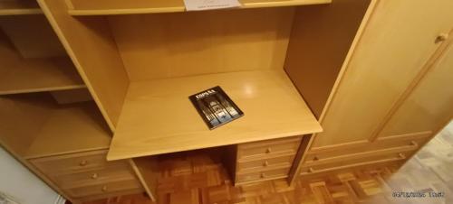 a book sitting on a table in a closet at Dreams Work - Your refuge in Burgos in Burgos