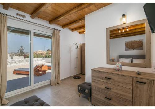Ένα ή περισσότερα κρεβάτια σε δωμάτιο στο Villa Vatos