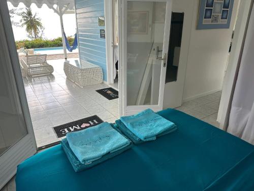 Postel nebo postele na pokoji v ubytování Villa en bord de mer à Saint-Pierre, 100 m²