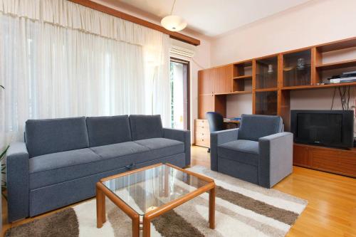 Coin salon dans l'établissement Apartment Ružmarin