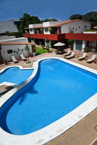 Der Swimmingpool an oder in der Nähe von Hotel Hacienda