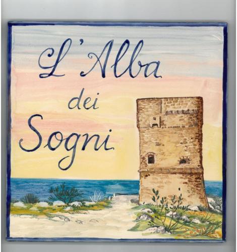 a painting of a lighthouse with the words ilia del secent at L'Alba dei Sogni in Marina Serra