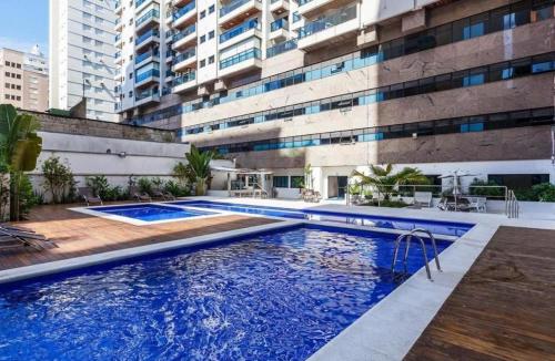 Πισίνα στο ή κοντά στο Flat Capitania Varam Guarujá