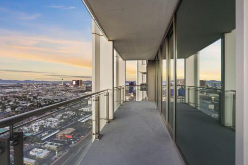 a view of a city from the balcony of a building at The Celine Riviera Suite at Palms Place in Las Vegas
