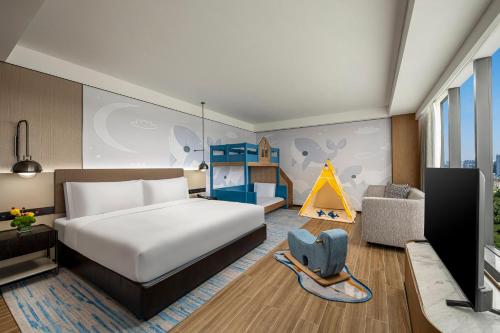Postel nebo postele na pokoji v ubytování Crowne Plaza Sanya Yazhou Bay by IHG
