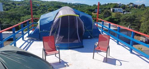 Rooster Run Glamping Camping has rooftop and off the ground Glamping experience for 1 to 16 in a single tent and views of The Rain Forrest and to Culebra across the Atlantic Ocean w Tents, Linens, Deluxe Air Beds, Warm Shower and More at a Great Price