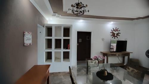 TV a/nebo společenská místnost v ubytování Casa no centro de Araruama com piscina