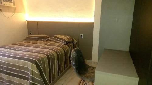 Ein Bett oder Betten in einem Zimmer der Unterkunft Flat at Studio Manaíra in JAMPA