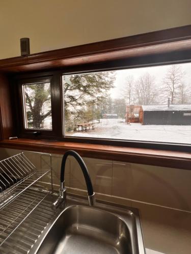 Afbeelding uit fotogalerij van Cabañas Altos del Sollipulli in Rumiñano