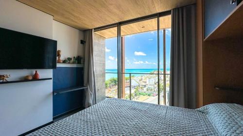 Ένα ή περισσότερα κρεβάτια σε δωμάτιο στο Edifício New Time Apto 1016 Pajuçara Maceió AL
