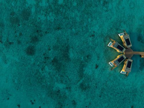 an overhead view of an island in the ocean at Centara Mirage Lagoon Maldives in Nakachchafushi