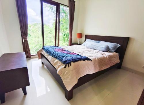 Ένα ή περισσότερα κρεβάτια σε δωμάτιο στο Ocean View Large 5 Bedroom Villa