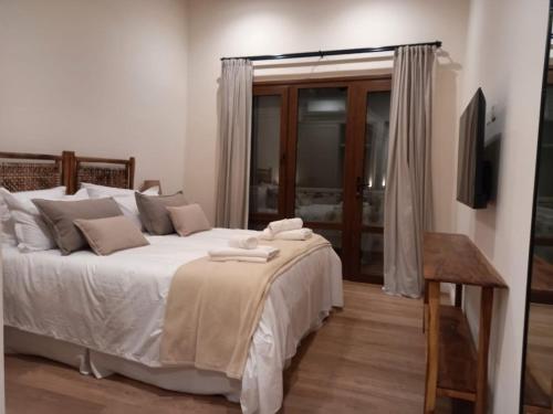 Hotel El Candil Tilcaraにあるベッド