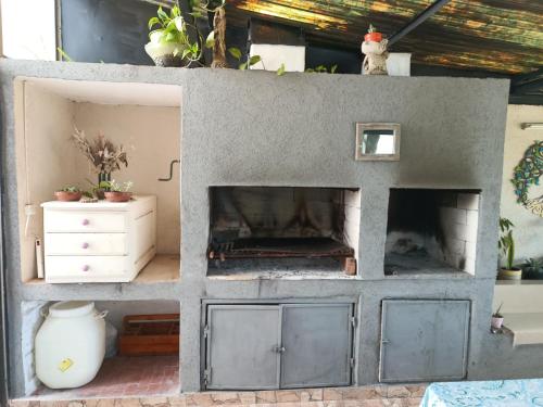 a model of a fake fireplace in a living room at Morena`s Home in Don Torcuato