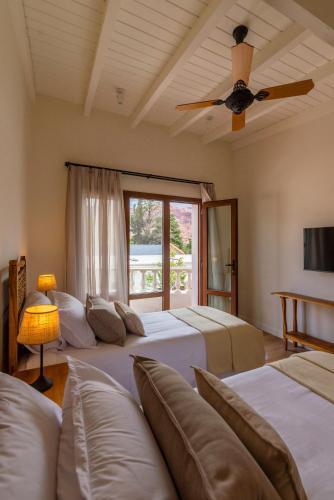 Hotel El Candil Tilcaraにあるベッド