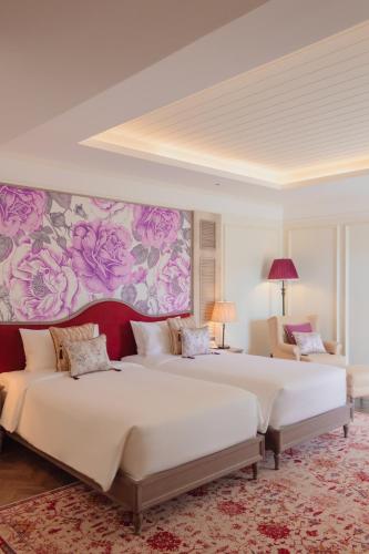Postel nebo postele na pokoji v ubytování Mercure Dalat Resort