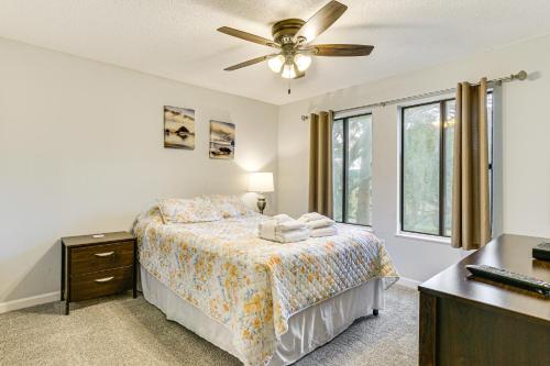 a bedroom with a bed and a ceiling fan at Beach and Pool Access Tranquil Hilton Head Getaway in Hilton Head Island