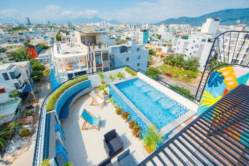 an overhead view of a swimming pool on a building at The BackPacker Hotel in Da Nang