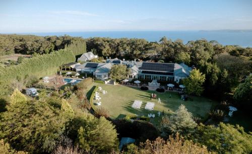 an aerial view of a large house with a yard at Bells at Killcare Boutique Hotel, Restaurant & Spa in Killcare