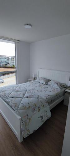 Ένα ή περισσότερα κρεβάτια σε δωμάτιο στο Apartamento San Bartolo