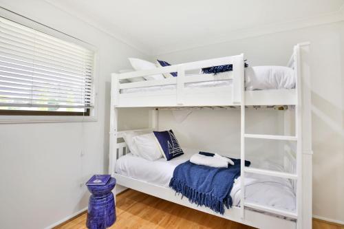 Katil atau katil-katil dalam bilik di Indigo Pet Friendly 5 Mins Walk to Bay