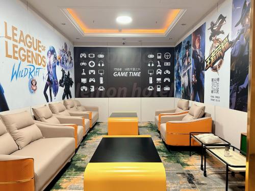 a waiting room with couches and a table at Lemon Hotel - Hangzhou West Lake Fengqi Road in Hangzhou