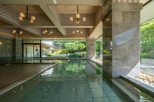 Πισίνα στο ή κοντά στο Kinugawa Grand Hotel Yumenotoki