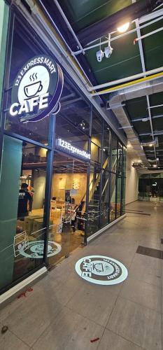 a store front of a car shop with a sign at Edumetro B32 3 Bedroom Subang Sunway By MICASA GROUP in Subang Jaya