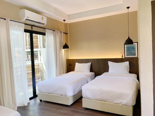 Cama o camas de una habitación en Suncloud Hotel Koh Samet