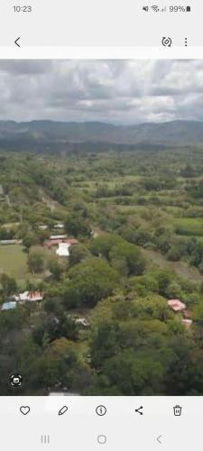 an aerial view of a forested area from an airplane at Cabaña de Lucas in Loma Bonita