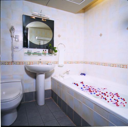 Koupelna v ubytování Tian Long Hotel