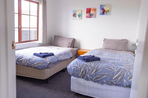Ένα ή περισσότερα κρεβάτια σε δωμάτιο στο Baudins Accommodation