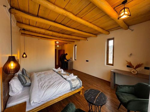 Letto o letti in una camera di Yeti Resort Hunder