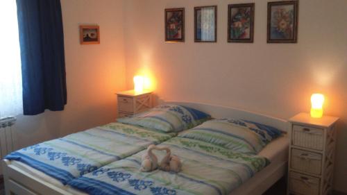 Posteľ alebo postele v izbe v ubytovaní Apartments Romantica Sabunike