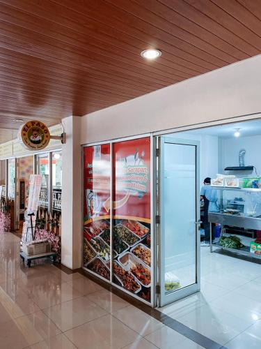 a store with a display case with food in it at 3BR Apartemen Sudirman Bandung in Bandung