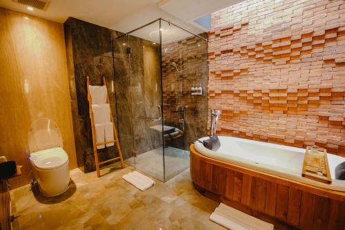 Koupelna v ubytování Maca Villas & Spa Bali
